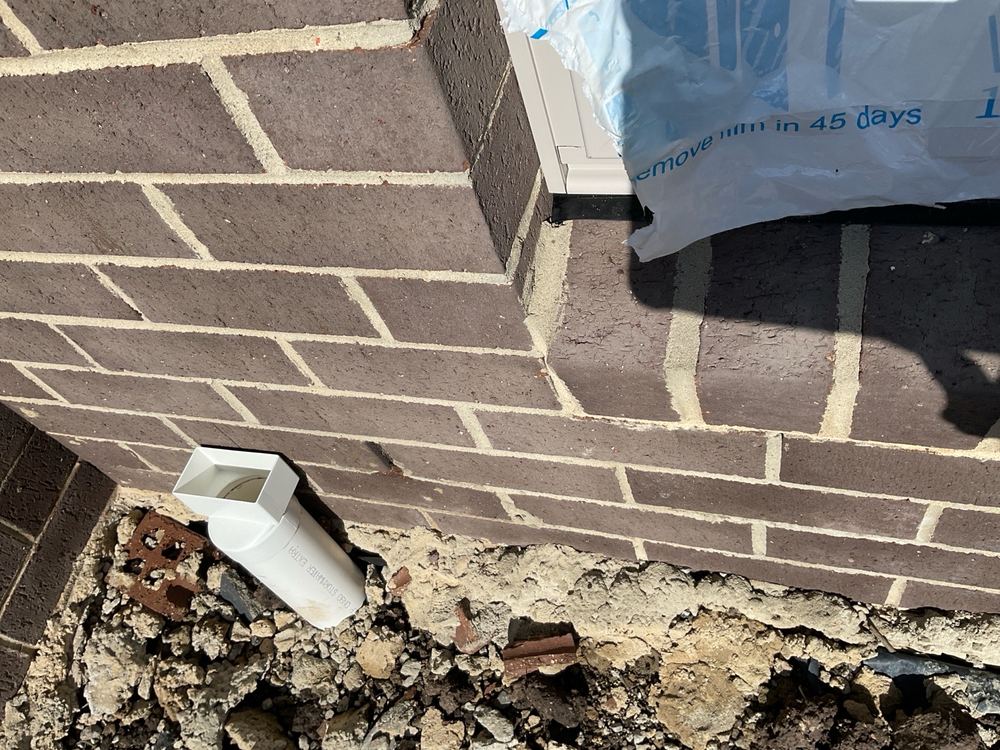 Flashing under a window not installed properly, leaving a path for water, Clyde North