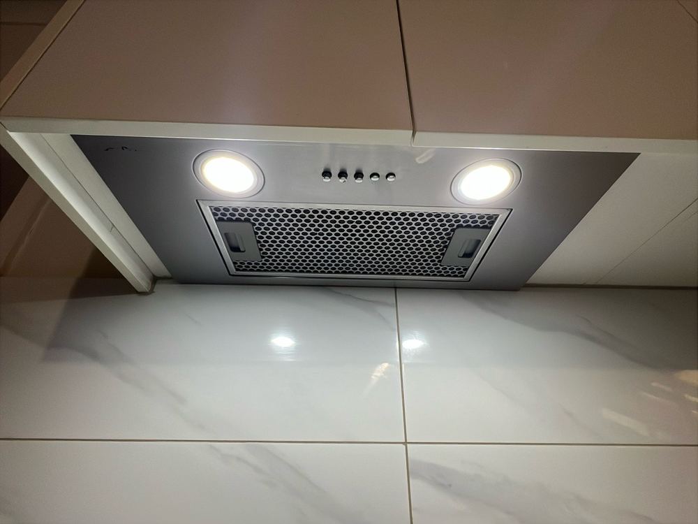 Rangehood venting grease and steam into the roof space instead of outside, found during a pre-purchase inspection in Dandenong North