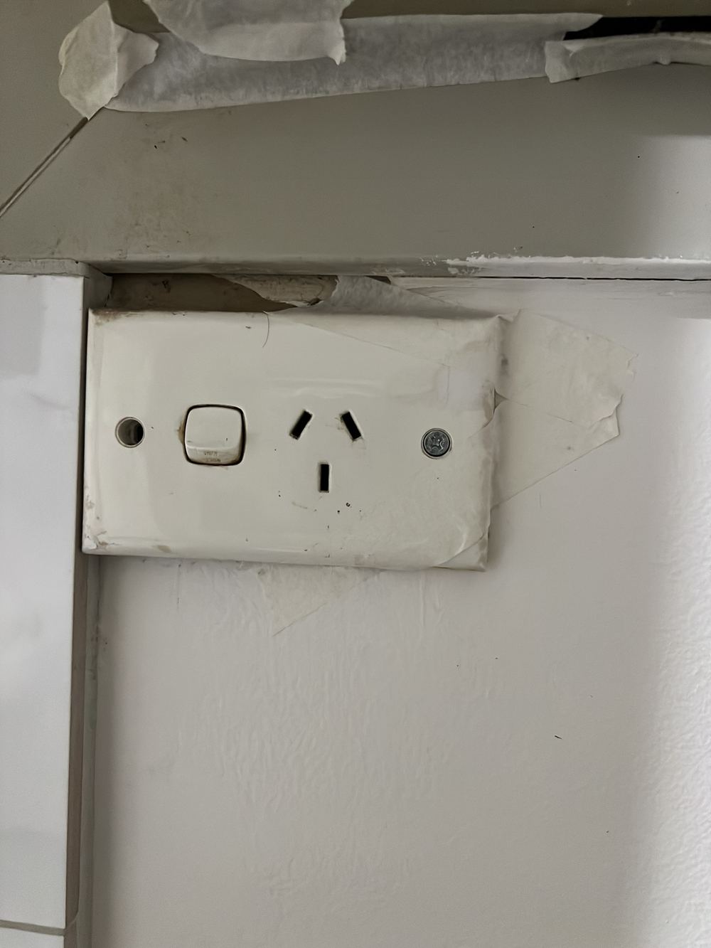 Loose power outlet referred to a licensed electrician to secure, found during a pre-purchase inspection in Dandenong North
